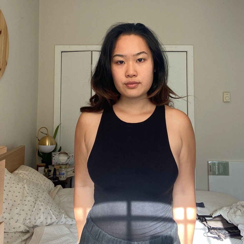 Aritzia black top/ bodysuit. Size M. New